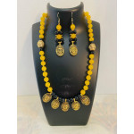 CBHJ47 Yellow and black beads with buddha pendants