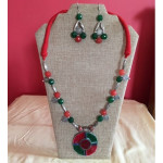 CBHJ64 Green and red beads with enamel pendant and red thread